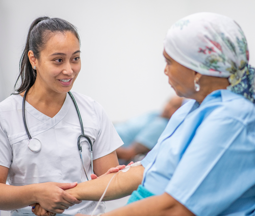 Adult cancer patient with doctor