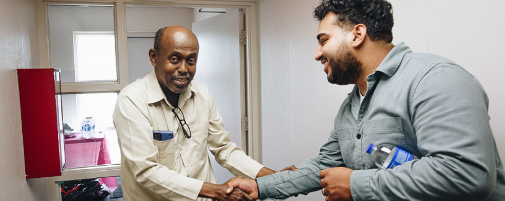 two people shaking hands