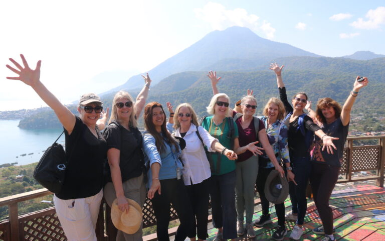 Guatemala travel group in front of Lake Atitlán
