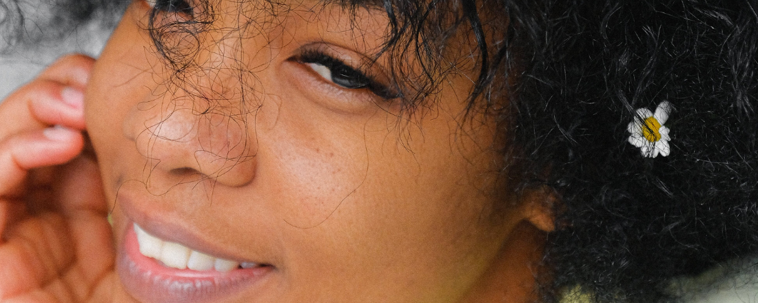 African American woman with a flower in hair