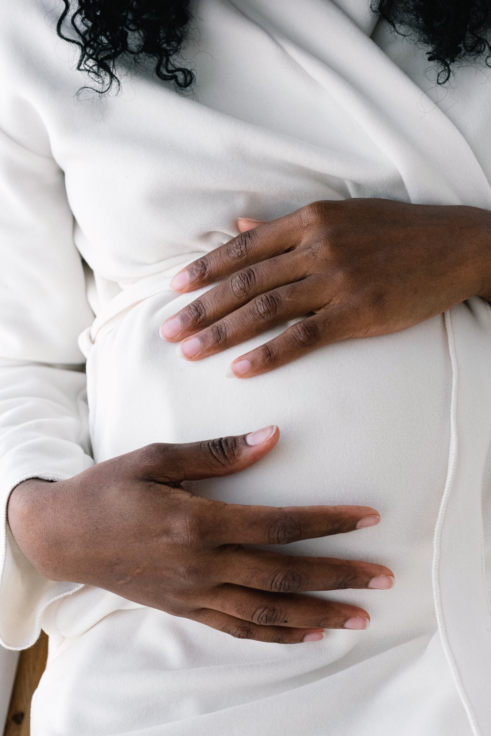 pregnant mom holding her stomach