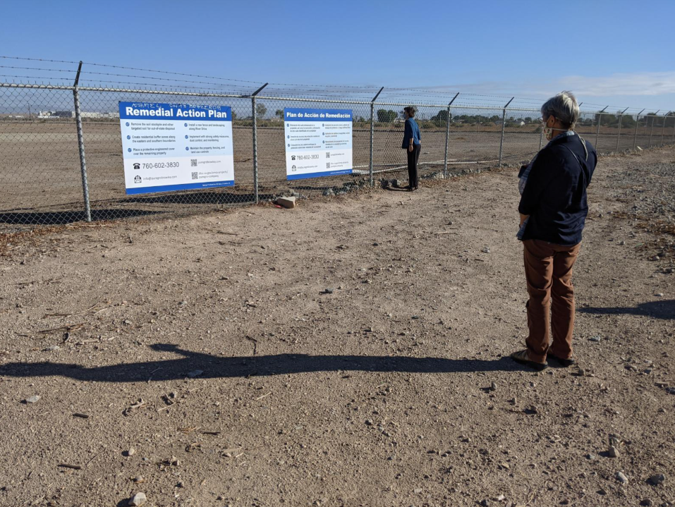 The area where PureGro used to be is fenced off with notices of the Remedial Action Plan large