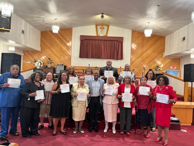 group of AC Care navigators holding certificates