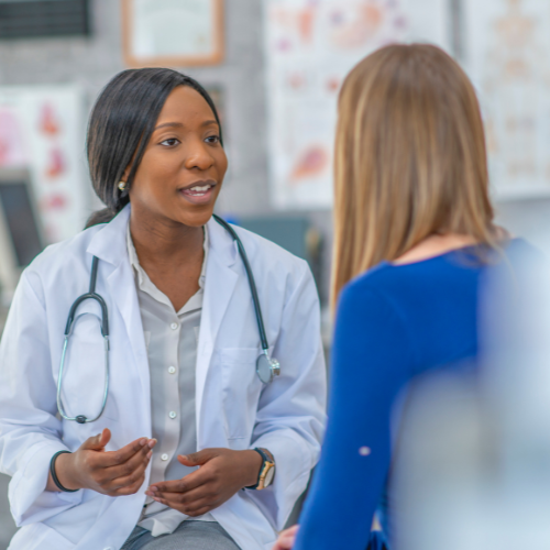 doctor speaking to patient