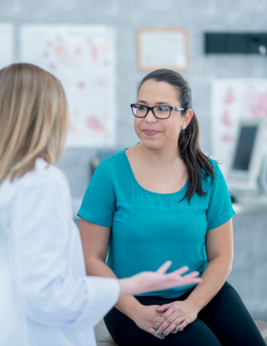 Doctor with female patient