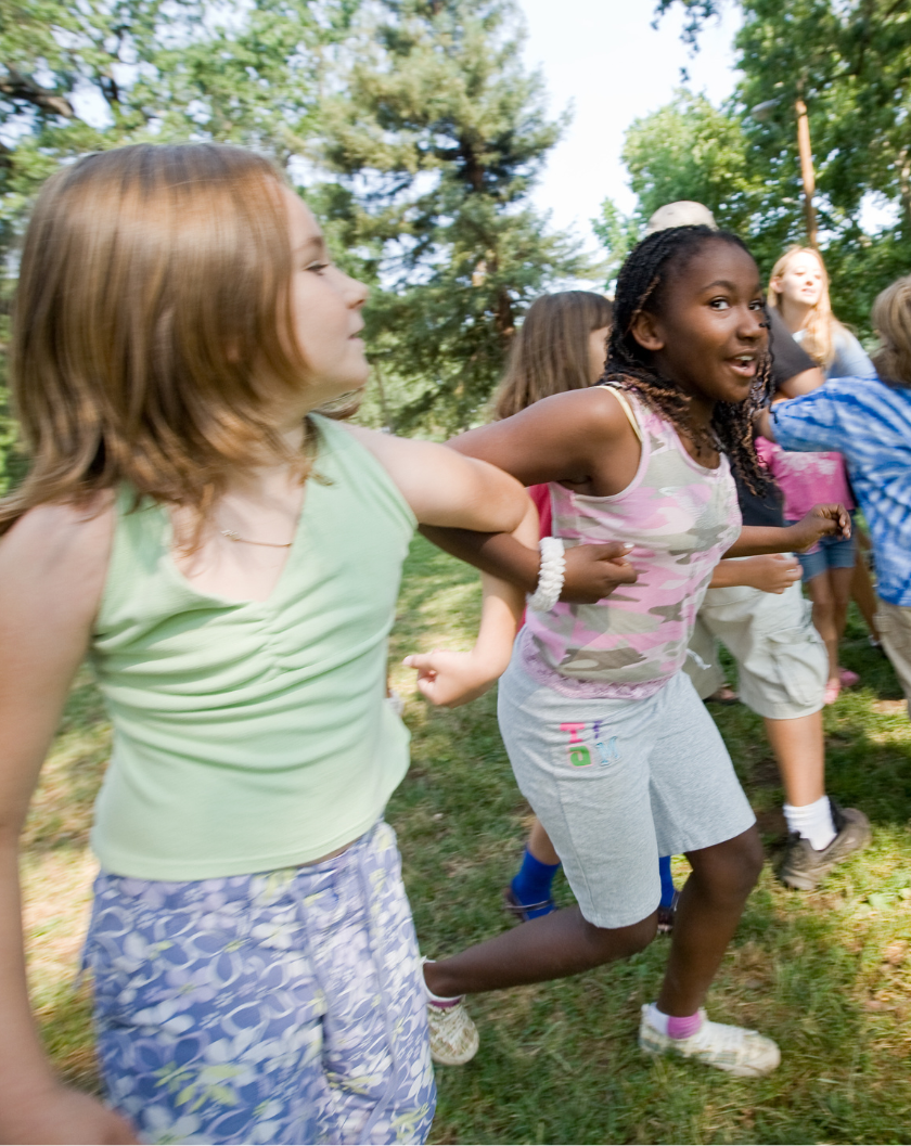 Children playing outside in a park