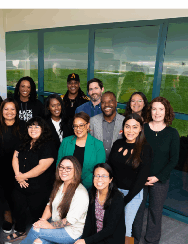 Group photo of Tasha with Rise Up leaders from California