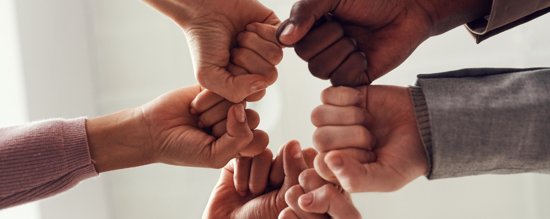 hands in a huddle
