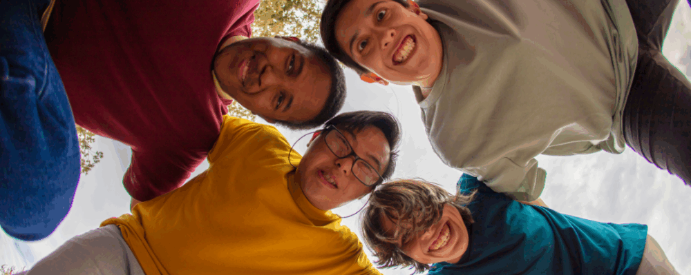 people with special needs standing in a circle