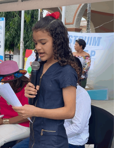 girl speaking in microphone
