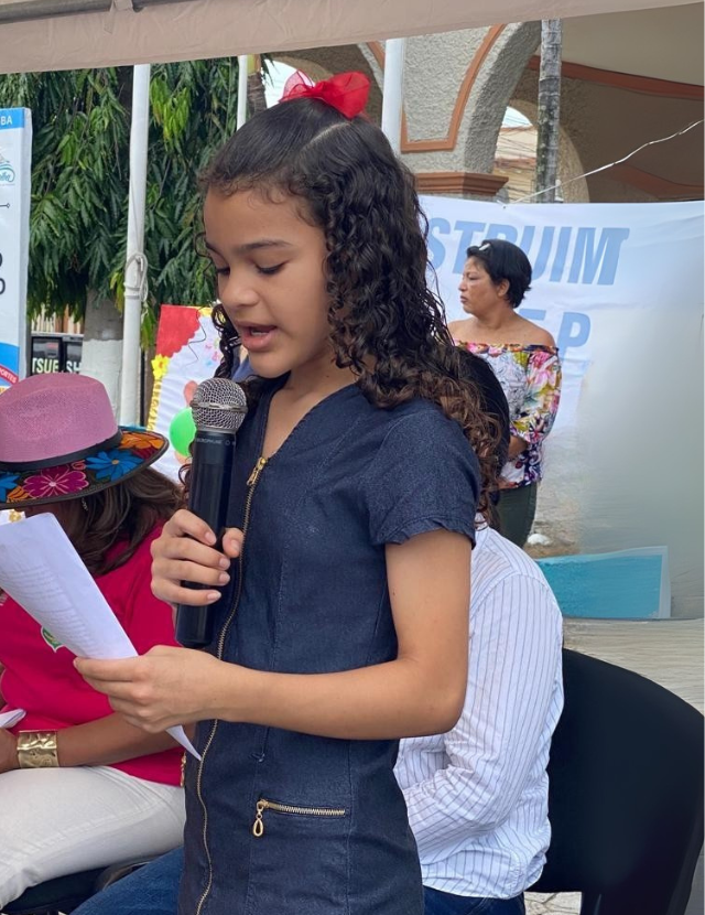 girl speaking in microphone