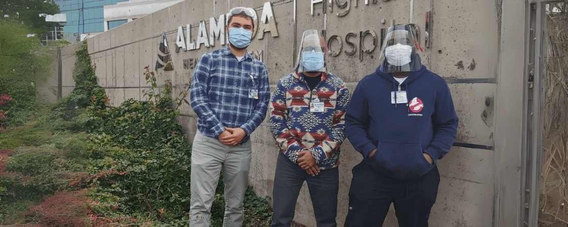 CA Bridge navigators in front of hospital building