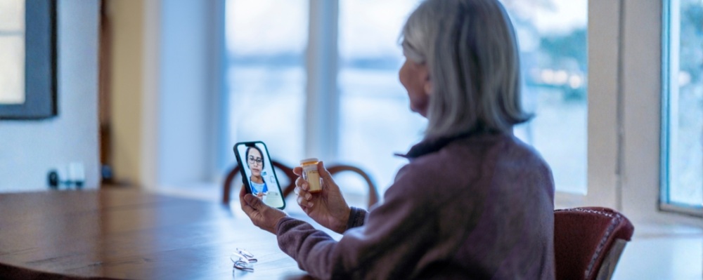 elderly patient on virtual call with doctor